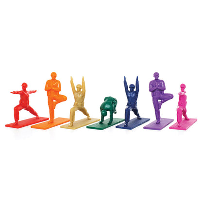 Yoga Joes Series 1 Rainbow figurines shown out of their package.  Assorted colors and poses shown.